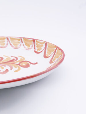 White ceramic dish hand-painted in spain